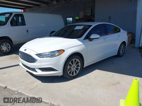 2017 Ford Fusion SE z VIN 3FA6P0HD7HR309432, wystawiony jako IAAI lot #42163947 z przebiegiem 201 575 mil mil oraz . Historia ofert i sprzedaży dostępna na DreamBid. Obrazek 2.