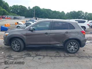 2018 Mitsubishi Outlander ES z VIN JA4AP3AU6JZ006542, wystawiony jako IAAI lot #42253505 z przebiegiem 109 722 mil mil oraz . Historia ofert i sprzedaży dostępna na DreamBid. Obrazek 14.