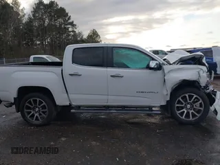 2021 GMC Canyon 4WD Denali with VIN 1GTG6EEN6M1240894, listed as a IAAI auction lot 41387786 with 73,323 mi miles. Bid and sale history available at carsss.com. Image 13.