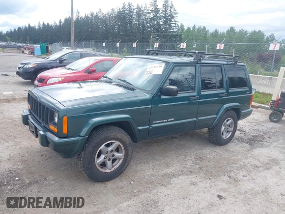1999 Jeep Cherokee Sport with VIN 1J4FF68S5XL677243, listed as a IAAI auction lot 42221329 with 293,808 mi miles and . Bid and sale history available at DreamBid. Image 2.