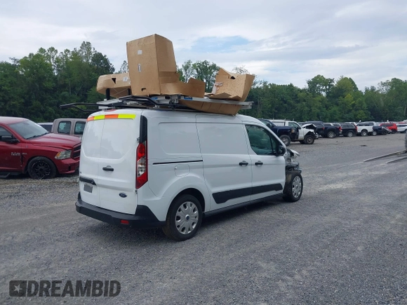 2023 Ford Transit Connect XLT z VIN NM0LS7T23P1548864, wystawiony jako IAAI lot #42621449 z przebiegiem 103 422 mil mil oraz . Historia ofert i sprzedaży dostępna na DreamBid. Obrazek 3.
