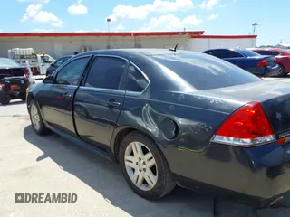2014 Chevrolet Impala LT with VIN 2G1WB5E31E1106255, listed as a IAAI auction lot 41960424 with 235,070 mi miles and . Bid and sale history available at DreamBid. Image 6.