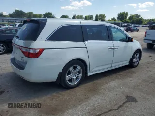 2013 Honda Odyssey Touring with VIN 5FNRL5H99DB052538, listed as a Copart auction lot 66310875 with 192,052 mi miles and Clean title. Bid and sale history available at DreamBid. Image 3.