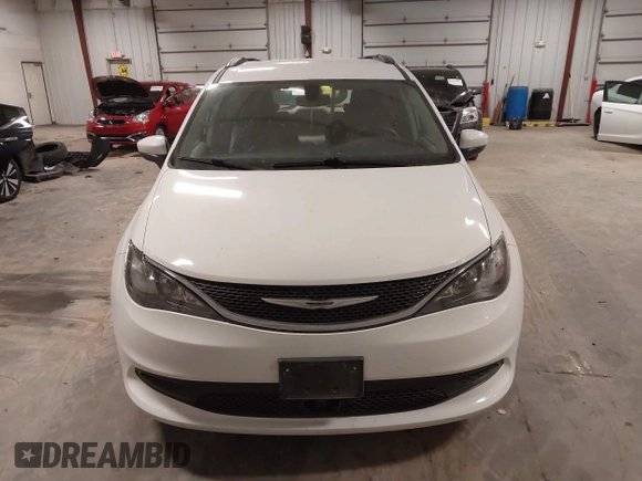 2021 Chrysler Voyager LXi with VIN 2C4RC1DG5MR508956, listed as a IAAI auction lot 41547647 with 104,563 mi miles and . Bid and sale history available at DreamBid. Image 13.