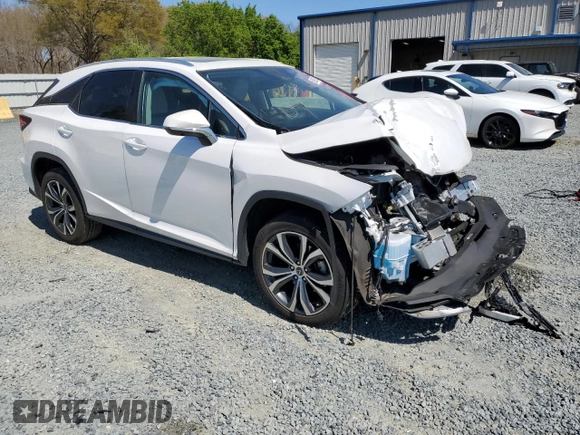 2021 Lexus RX with VIN 2T2HZMAA8MC202308, listed as a Copart auction lot 50890575 with 32,981 mi miles and Salvage Title. Bid and sale history available at carsss.com. Image 4.