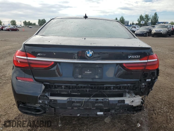 2019 BMW 7 Series 750i xDrive with VIN WBA7B0C53KG527537, listed as a Copart auction lot 64113345 with 36,820 mi miles and Salvage title. Bid and sale history available at DreamBid. Image 6.