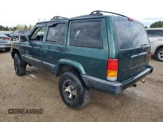 2000 Jeep Cherokee with VIN 1J4FF48S3YL149593, listed as a Copart auction lot 52489045 with 290,231 mi miles and Salvage title. Bid and sale history available at DreamBid. Image 2.