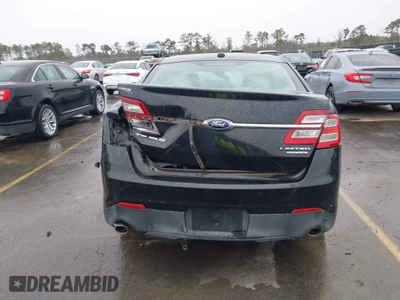 2014 Ford Taurus Limited with VIN 1FAHP2F87EG130532, listed as a IAAI auction lot 41618112 with 118,474 mi miles. Bid and sale history available at carsss.com. Image 16.