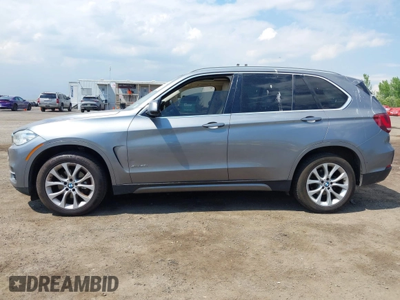 2014 BMW X5 xDrive35i z VIN 5UXKR0C5XE0K43570, wystawiony jako IAAI lot #42211578 z przebiegiem 260 817 mil mil oraz . Historia ofert i sprzedaży dostępna na DreamBid. Obrazek 14.
