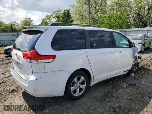 2014 Toyota Sienna LE AAS with VIN 5TDKK3DC6ES497746, listed as a Copart auction lot 56125845 with 142,596 mi miles and Salvage Title. Bid and sale history available at DreamBid. Image 3.
