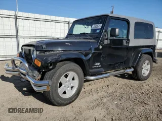 2005 Jeep Wrangler Unlimited with VIN 1J4FA44S55P310471, listed as a Copart auction lot 52320685 with 144,989 mi miles and Salvage title. Bid and sale history available at DreamBid. Image 1.