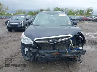 2016 Subaru Forester Touring z VIN JF2SJAXC4GH536118, wystawiony jako IAAI lot #42208701 z przebiegiem 117 227 mil mil oraz . Historia ofert i sprzedaży dostępna na DreamBid. Obrazek 12.