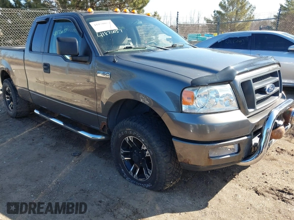 2005 Ford F-150 STX with VIN 1FTRX14W55NB19633, listed as a IAAI auction lot 41870057 with 100,436 mi miles. Bid and sale history available at carsss.com. Image 1.
