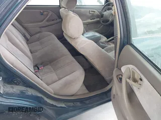 1998 Toyota Camry LE z VIN 4T1BG22K2WU296053, wystawiony jako IAAI lot #42334546 z przebiegiem 257 496 mil mil oraz . Historia ofert i sprzedaży dostępna na DreamBid. Obrazek 8.