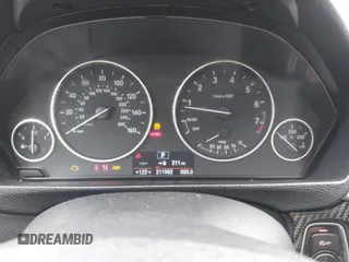 2014 BMW 3 Series 320i xDrive with VIN WBA3C3C58EP661364, listed as a IAAI auction lot 41947049 with 211,982 mi miles and . Bid and sale history available at DreamBid. Image 7.