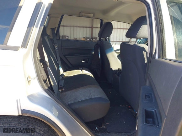 2010 Jeep Grand Cherokee Laredo with VIN 1J4PS4GK5AC156150, listed as a IAAI auction lot 41585346 with 178,237 mi miles. Bid and sale history available at carsss.com. Image 8.
