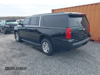 2019 Chevrolet Suburban LT with VIN 1GNSKHKC4KR405843, listed as a IAAI auction lot 41944385 with 123,071 mi miles and . Bid and sale history available at DreamBid. Image 3.