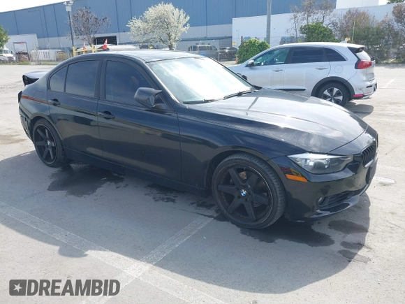 2014 BMW 3 Series 328i with VIN WBA3C1C55EK115218, listed as a IAAI auction lot 41824817 with 101,941 mi miles. Bid and sale history available at carsss.com. Image 1.