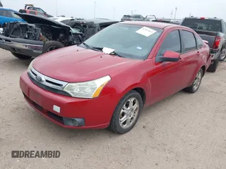 2009 Ford Focus SES with VIN 1FAHP36N59W244231, listed as a IAAI auction lot 41967664 with 141,937 mi miles. Bid and sale history available at carsss.com. Image 2.