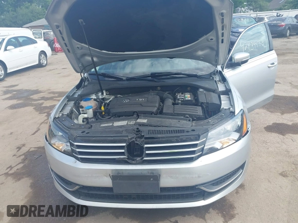 2014 Volkswagen Passat SE with VIN 1VWBT7A37EC039074, listed as a IAAI auction lot 42439583 with 109,654 mi miles and . Bid and sale history available at DreamBid. Image 10.
