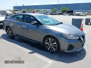 2021 Nissan Maxima SV z VIN 1N4AA6CV3MC506783, wystawiony jako IAAI lot #42083276 z przebiegiem 76 675 mil mil oraz . Historia ofert i sprzedaży dostępna na DreamBid. Obrazek 1.