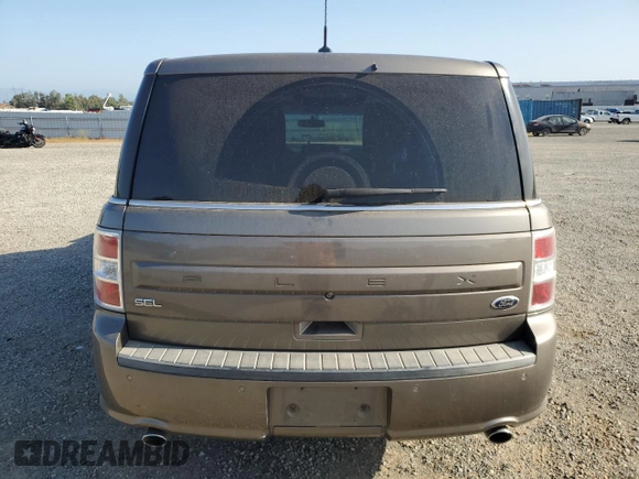 2014 Ford Flex SEL z VIN 2FMGK5C86EBD41038, wystawiony jako Copart lot #55609235 z przebiegiem 157 934 mil mil oraz Szkoda całkowita • Salvage title. Historia ofert i sprzedaży dostępna na DreamBid. Obrazek 6.