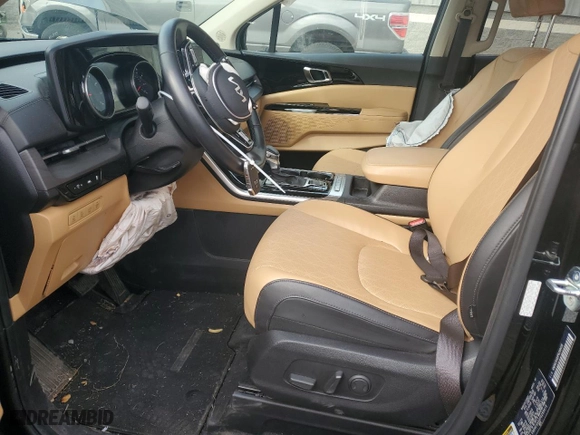 2023 Kia Carnival EX with VIN KNDNC5H33P6299418, listed as a Copart auction lot 71959084 with 22,675 mi miles and Salvage Title. Bid and sale history available at carsss.com. Image 7.