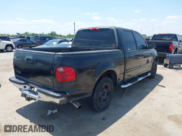 2002 Ford F-150 XLT with VIN 1FTRW07602KD37873, listed as a IAAI auction lot 42048067 with 1 mi miles. Bid and sale history available at carsss.com. Image 4.