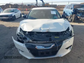 2016 Nissan Maxima SL with VIN 1N4AA6AP2GC437187, listed as a IAAI auction lot 41776458 with 72,990 mi miles and . Bid and sale history available at DreamBid. Image 12.