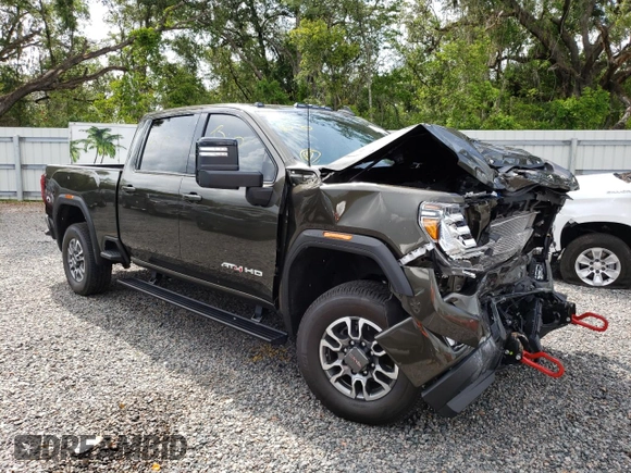 2023 GMC Sierra 3500HD AT4 z VIN 1GT49VEY3PF127108, wystawiony jako Copart lot #57052823 z przebiegiem 9915 mil mil oraz Szkody całkowita. Historia ofert i sprzedaży dostępna na DreamBid. Obrazek 4.