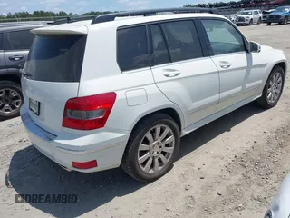 2012 Mercedes-Benz GLK with VIN WDCGG5GB4CF877097, listed as a IAAI auction lot 42127733 with Not Provided miles. Bid and sale history available at carsss.com. Image 4.