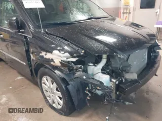2016 Chrysler Town & Country Touring with VIN 2C4RC1BG1GR165957, listed as a IAAI auction lot 41937581 with 156,769 mi miles. Bid and sale history available at carsss.com. Image 6.