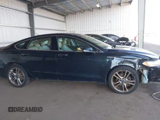2014 Ford Fusion Titanium with VIN 3FA6P0K97ER328482, listed as a IAAI auction lot 40252350 with 137,128 mi miles. Bid and sale history available at carsss.com. Image 13.