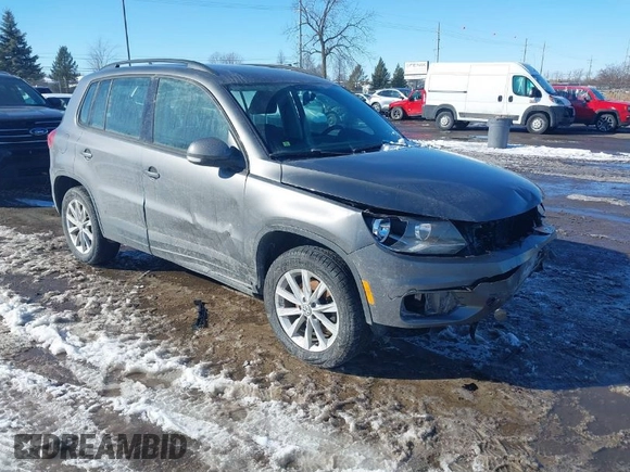 2017 Volkswagen Tiguan S z VIN WVGAV7AX1HK050251, wystawiony jako IAAI lot #41608261 z przebiegiem 172 298 mil mil oraz . Historia ofert i sprzedaży dostępna na DreamBid. Obrazek 1.