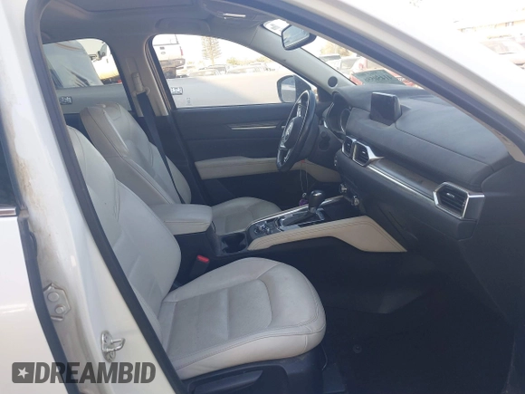 2017 Mazda CX-5 Grand Touring with VIN JM3KFBDL6H0164993, listed as a IAAI auction lot 41450556 with 97,733 mi miles. Bid and sale history available at carsss.com. Image 5.