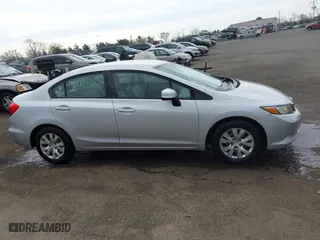 2012 Honda Civic Sdn LX with VIN 19XFB2F50CE353837, listed as a IAAI auction lot 41961162 with 140,583 mi miles. Bid and sale history available at carsss.com. Image 14.