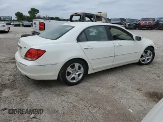 2005 Acura RL z VIN JH4KB16515C020791, wystawiony jako Copart lot #59802735 z przebiegiem Nie podano mil oraz Szkoda całkowita • Salvage title. Historia ofert i sprzedaży dostępna na DreamBid. Obrazek 3.