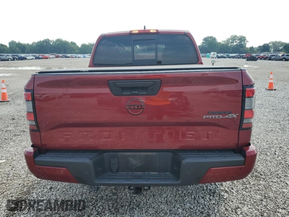 2022 Nissan Frontier Pro-4X with VIN 1N6ED1EK1NN601886, listed as a Copart auction lot 65182295 with 51,879 mi miles and Salvage title. Bid and sale history available at DreamBid. Image 6.
