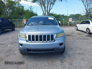 2013 Jeep Grand Cherokee Laredo with VIN 1C4RJEAG2DC517303, listed as a IAAI auction lot 42040405 with 222,952 mi miles. Bid and sale history available at carsss.com. Image 12.