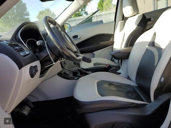 2018 Jeep Compass Limited with VIN 3C4NJDCB0JT144305, listed as a Copart auction lot 54834825 with 202,781 mi miles and Salvage title. Bid and sale history available at DreamBid. Image 7.