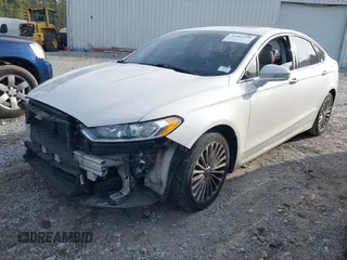 2015 Ford Fusion Titanium with VIN 3FA6P0K92FR274994, listed as a IAAI auction lot 41402325 with 157,332 mi miles. Bid and sale history available at carsss.com. Image 15.