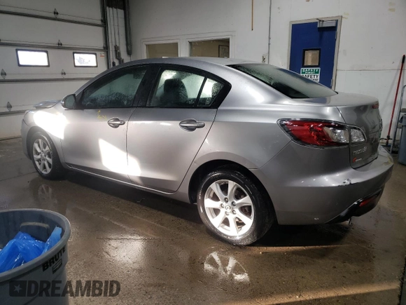 2010 Mazda 3 i SV with VIN JM1BL1SF0A1332815, listed as a Copart auction lot 87484534 with 121,187 mi miles and Salvage Title. Bid and sale history available at DreamBid. Image 2.