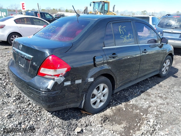 2007 Nissan Versa 1.8 S with VIN 3N1BC11E27L440690, listed as a IAAI auction lot 41832369 with 999,999 mi miles. Bid and sale history available at carsss.com. Image 4.