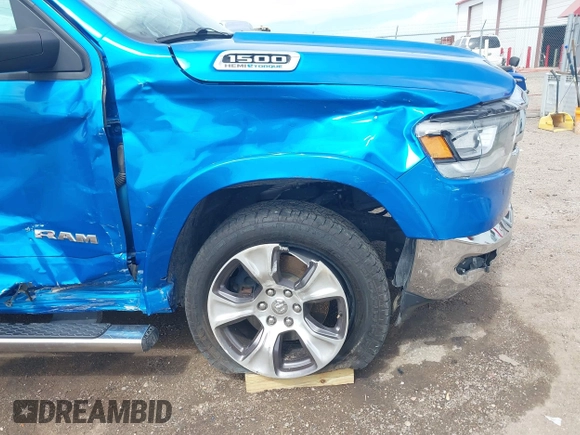 2021 Ram 1500 Laramie with VIN 1C6SRFJT1MN774879, listed as a IAAI auction lot 42242318 with 51,971 mi miles and . Bid and sale history available at DreamBid. Image 6.