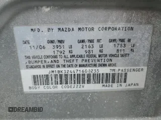 2007 Mazda 3 S Touring with VIN JM1BK324471680235, listed as a Copart auction lot 44908865 with 136,074 mi miles and Salvage Title. Bid and sale history available at DreamBid. Image 12.