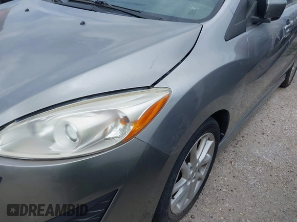 2012 Mazda 5 Grand Touring z VIN JM1CW2DL1C0126545, wystawiony jako IAAI lot #42301130 z przebiegiem 151 212 mil mil oraz . Historia ofert i sprzedaży dostępna na DreamBid. Obrazek 15.