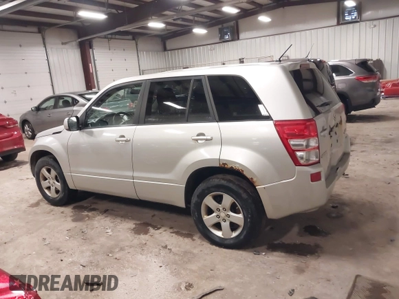 2012 Suzuki Grand Vitara Premium z VIN JS3TD0D62C4100440, wystawiony jako IAAI lot #41711815 z przebiegiem 171 527 mil mil oraz . Historia ofert i sprzedaży dostępna na DreamBid. Obrazek 14.