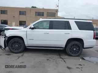 2019 GMC Yukon SLT with VIN 1GKS2BKC3KR160060, listed as a IAAI auction lot 42042122 with 124,733 mi miles. Bid and sale history available at carsss.com. Image 15.