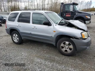 2002 Mazda Tribute LX with VIN 4F2CU08192KM41728, listed as a Copart auction lot 78221954 with 140,782 mi miles and Salvage Title. Bid and sale history available at carsss.com. Image 4.