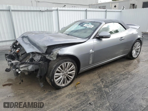 2010 Jaguar XK with VIN SAJWA4GB4ALB37114, listed as a Copart auction lot 77673824 with 99,999 mi miles and Salvage Title. Bid and sale history available at carsss.com. Image 1.